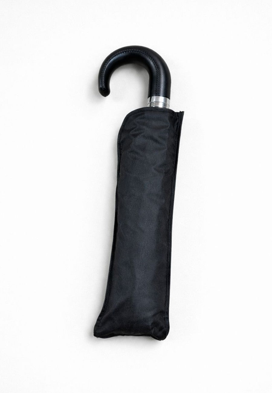 Paraguas plegable negro con mango de piel anti viento