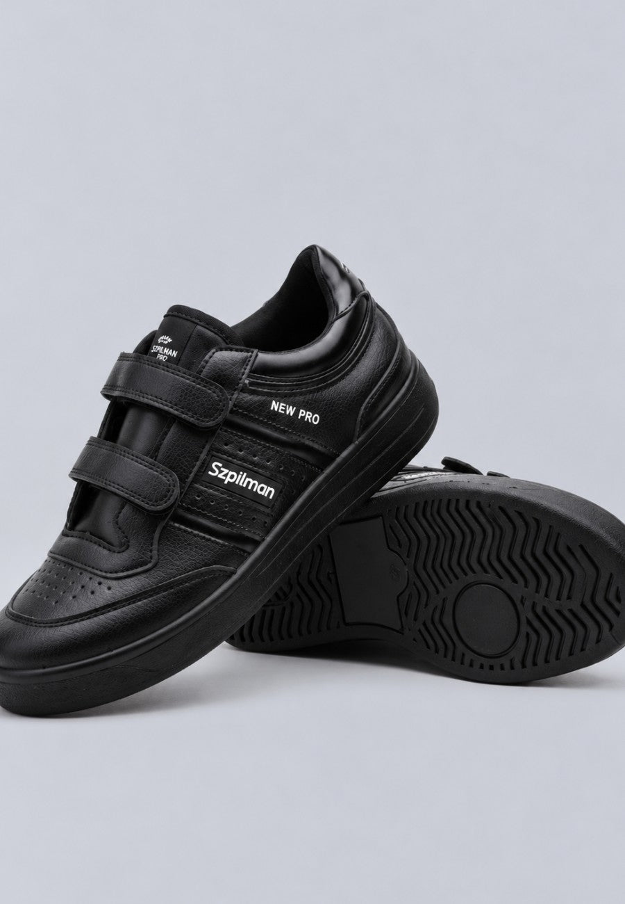 Zapatillas deportivas negras con tiras de velcro